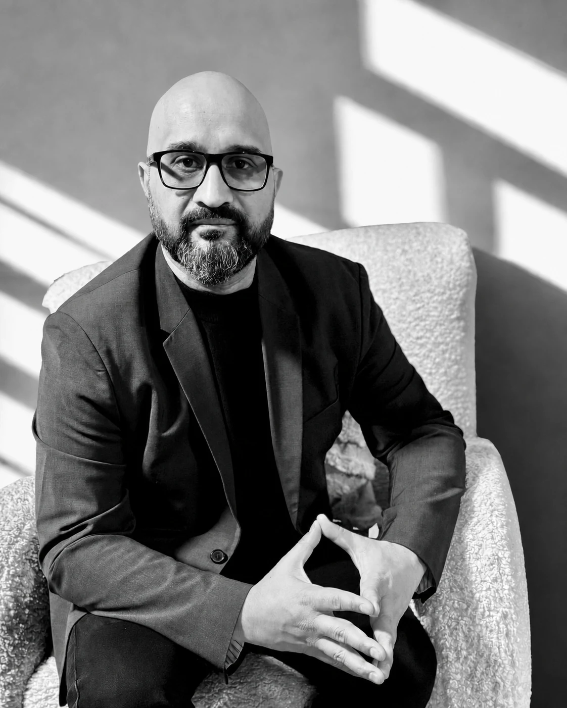 Anshul Lalit seated in a sunlit room