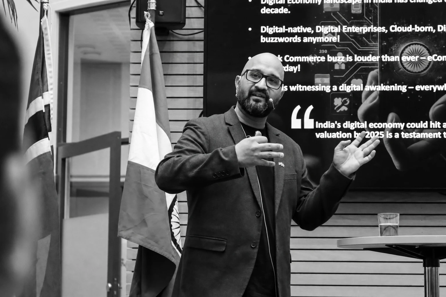 Anshul Lalit speaking to an audience at a professional forum
